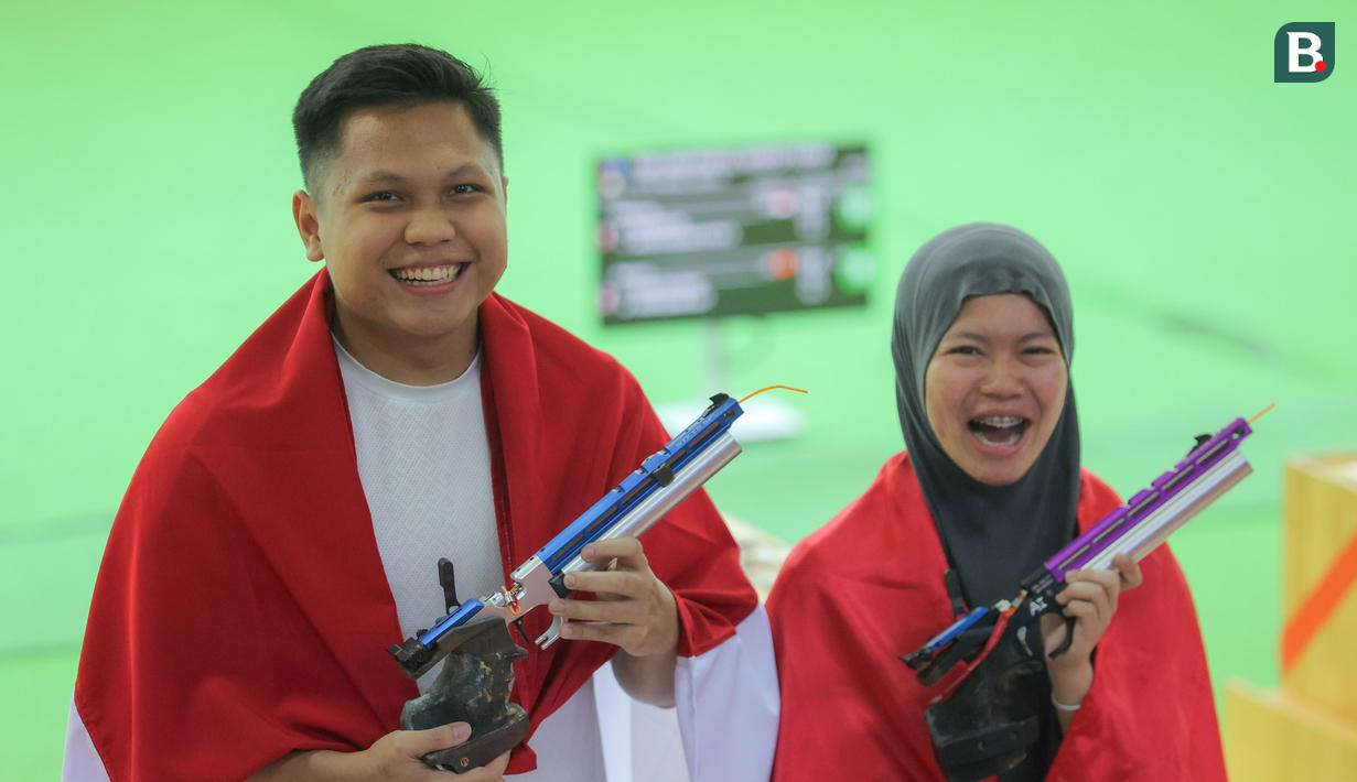 Keberhasilan ini terasa semakin spesial karena diraih setelah melalui persaingan ketat dengan Vietnam, yang dikenal sebagai salah satu kekuatan utama menembak di kawasan Asia Tenggara. (Bola.com/Bagaskara Lazuardi)