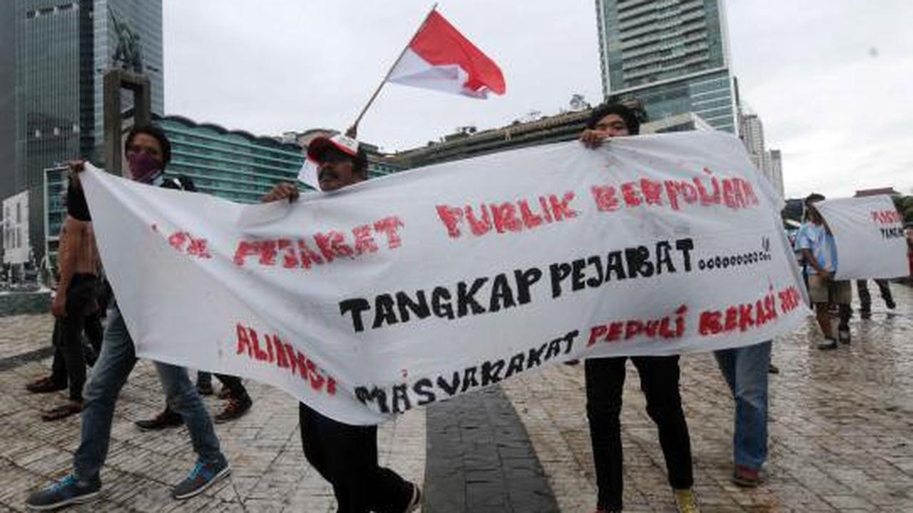 Demo anti-poligami di Bundaran HI
