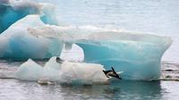 Ilustrasi melelehnya lapisan es di perairan Antartika. (AFP/Vanderlei Almeida)