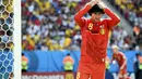 Ekspresi kekecewaan gelandang Belgia, Marouane Fellaini, saat gagal memanfaatkan peluang mencetak gol ke gawang Argentina di laga perempat final Piala Dunia 2014 di Stadion Nasional Brasilia, (5/7/2014). (REUTERS/Dylan Martinez) 