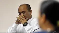 Terdakwa Gulat Medali Emas Manurung menjalani sidang lanjutan di Pengadilan Tipikor Jakarta, Senin (29/12/14). (Liputan6.com/Miftahul Hayat)