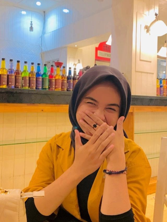 Megi Irawan dan Riva Syahdila