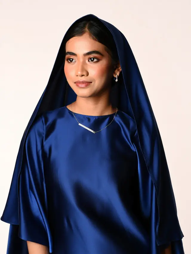 Gamis Kaftan Simple tapi Terlihat Mewah (Foto: Reve Art AI)