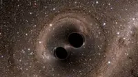 Sebuah simulasi komputer mengenai pertemuan lubang hitam (NASA Jet Propulsion Laboratory)