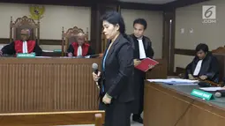 Terdakwa dugaan penerimaan suap dari pengusaha Tamin Sukardi, Merry Purba saat menjalani sidang pembacaan eksepsi di Pengadilan Tipikor, Jakarta, Senin (21/1). Merry merupakan Hakim adhoc Pengadilan Tipikor Medan. (Liputan6.com/Helmi Fithriansyah)