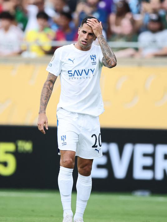Joao Cancelo juga memilih jalan keluar demi menyelamatkan kariernya. Ia resmi kembali ke Barcelona dengan status pinjaman bulan lalu. (AFP/Alex Grimm)