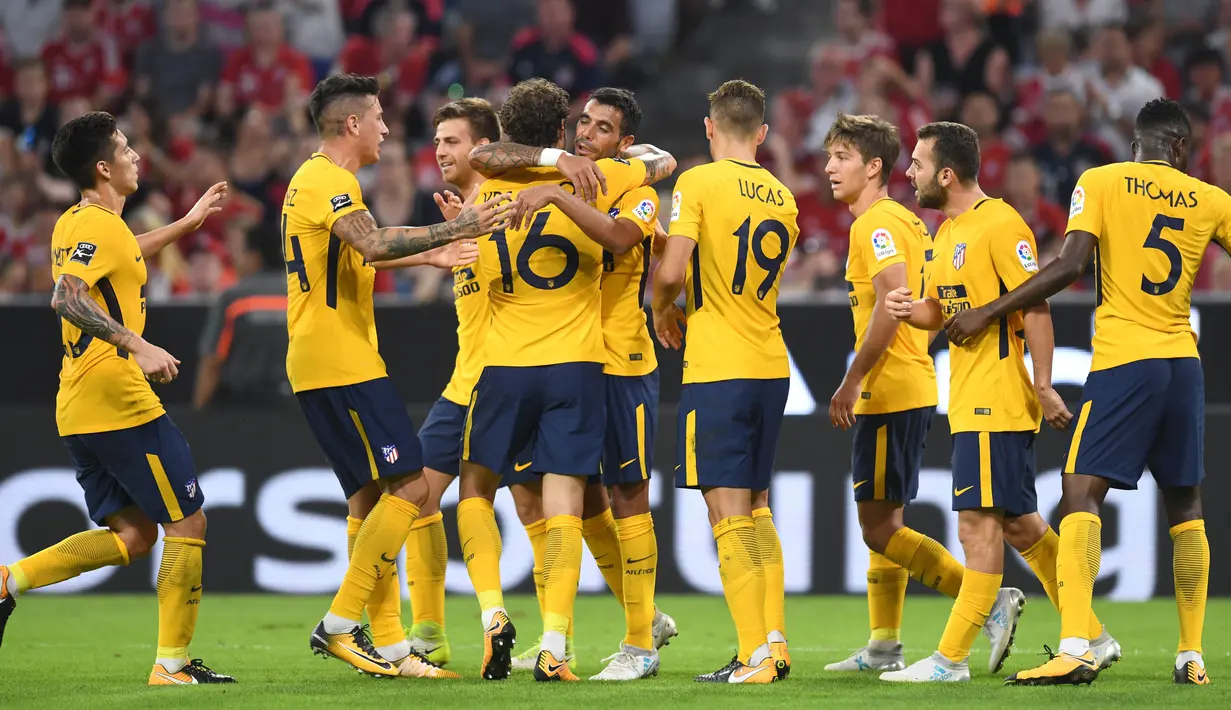 10. Atletico Madrid - Mengeluarkan 3,8 juta poundsterling per pekan. (AFP/Christof Stache)