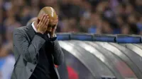 Bayern Munich's coach Pep Guardiola reacts during their Champions League quarterfinal first leg soccer match against Porto at Dragao stadium in Porto April 15, 2015. REUTERS/Miguel Vidal