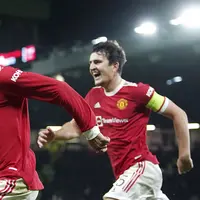 Akan tetapi, mental pemenang dan kaya pengalaman membuat Manchester United mampu membalikkan kedudukan. Marcus Rashford dan Harry Maguire berhasil mencetak gol yang membuat skor menjadi imbang 2-2. (Martin Rickett/PA via AP)