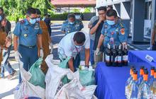 FOTO: Penyelundupan Sianida dan Miras Ilegal Senilai Setengah Miliar Lebih Digagalkan di Perairan Manado