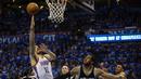 Pebasket OKC Thunder, Steven Adams (12) melakukan tembakan dua angka ke jaring Spurs pada lanjutan NBA Playoffs game ke-6 semifinal wilayah barat di Chesapeake Energy Arena,Oklahoma City, (12/5/2016). (Mark D. Smith-USA TODAY Sports)