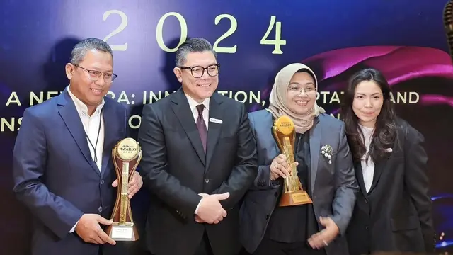 Direktur Utama Pegadaian Raih Penghargaan Tokoh Pendukung Inklusivitas Keuangan