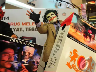 Aksi teatrikal advokasi publik bertajuk "Indonesia Harus Melek Bahaya Merokok", Jakarta, Selasa (24/06/2014) (Liputan6.com/Andrian M Tunay) 