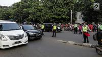 Ganjil genap Jakarta tak berlaku di akhir pekan, Sabtu (7/12/2024). (Liputan6.com/Faizal Fanani)