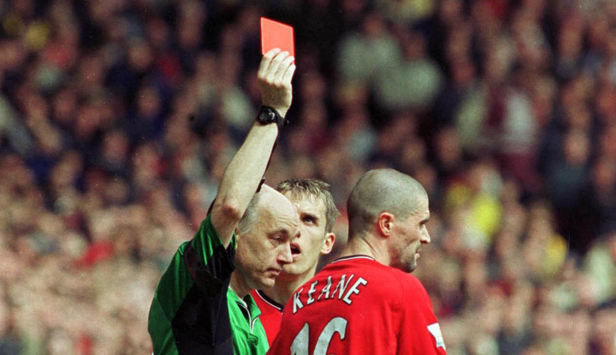 Selain itu, Keane juga pernah melakukan tekel brutal yang membuat pemain Manchester City, Alf-Inge Haaland, mengalami patah kaki. (AFP/Robin Parker)