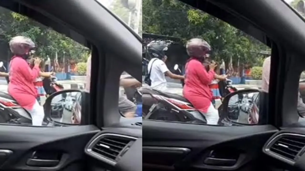 Emak-emak pemotor cari kutu rambut anaknya (Instagram/@magelang_raya)