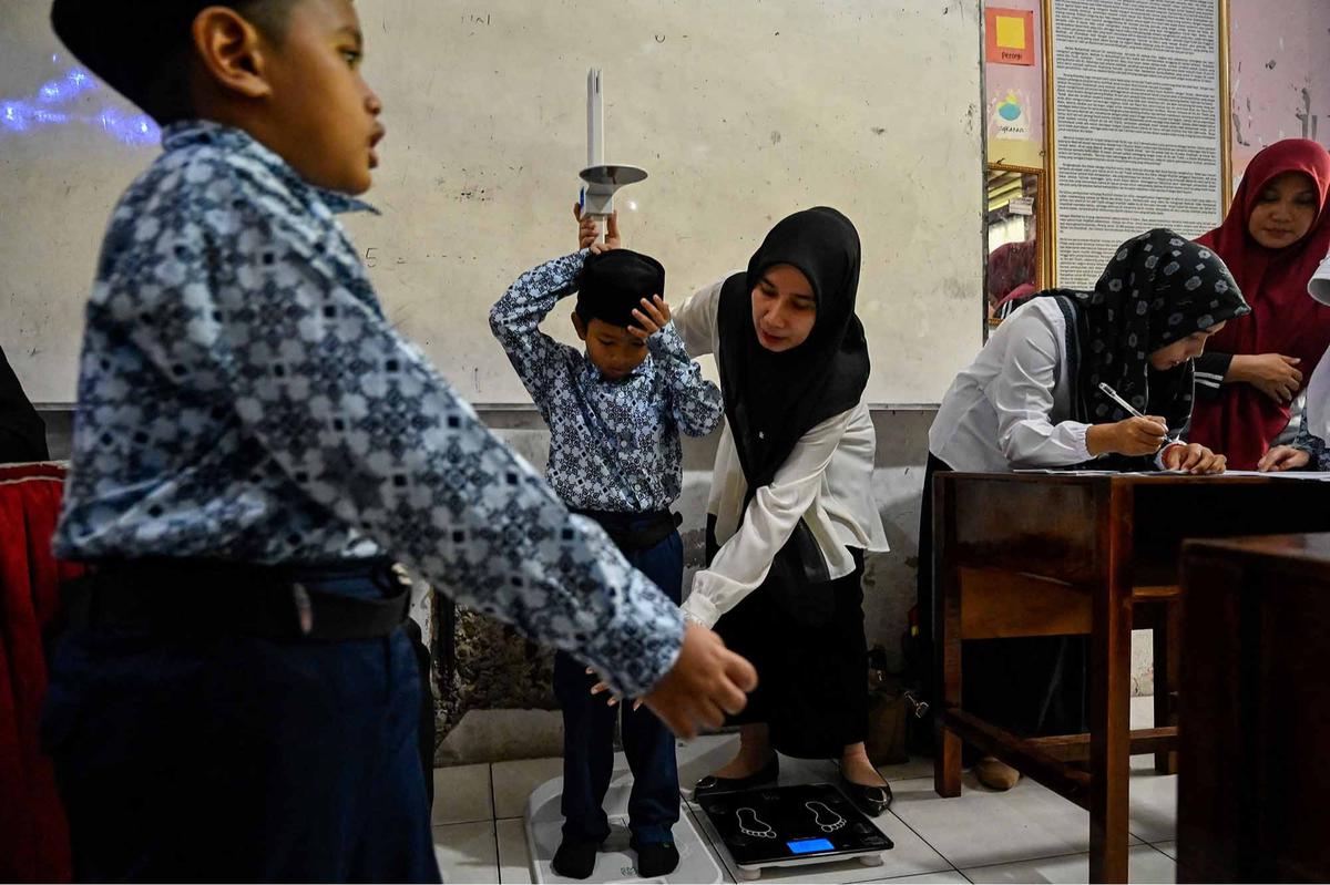 FOTO: Antusias Murid Madrasah Jalani Pemeriksaan Kesehatan Gratis
