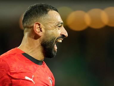 Pemain Mesir, Mohamed Salah melakukan selebrasi setelah mencetak gol ke gawang Benin dalam laga 16 besar Piala Afrika 2025 di Grand Stadium, Agadir, Maroko, Senin (05/01/2026) waktu setempat. (AP Photo/Mosa'ab Elshamy)
