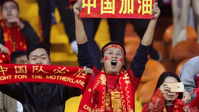 Fans Tiongkok saat laga melawan Suriah (China Stringer Network/Reuters)