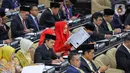 Rapat paripurna DPR pengucapan sumpah janji anggota DPR periode 2024-2029 dipimpin oleh pimpinan DPR sementara. (Liputan6.com/Angga Yuniar)