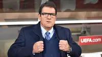 Ketika melatih Inggris, Fabio Capello terkenal ketat dengan para pemainnya. Dia melarang tampilan kasual di depan umum. Menurutnya para pemain terlihat buruk dan tidak profesional. (AFP/Kirill Kudryavtsev)