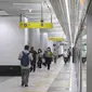 Penumpang berjalan usai menaiki moda transportasi MRT di Jakarta, Selasa (15/11/2022). PT MRT Jakarta (Perseroda) melakukan perubahan kebijakan waktu operasional yang berlaku mulai Selasa, 15 November 2022. (Liputan6.com/Herman Zakharia)