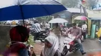 Harapan warga siraman hujan ini tidak hanya melenyapkan kabut asap tapi juga memadamkan api yang membakar lahan gambut.