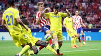 Lima gol kemenangan Atletico tercipta berkat Antoine Griezmann (2', 27'), Alvaro Morata (49'), Yannick Carrasco (57'-penalti), dan Nahuel Molina (73'). (Photo by Pierre-Philippe MARCOU / AFP)