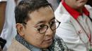 Ekspresi Wakil Ketua DPR Fadli Zon saat menghadiri sidang kedua musisi Ahmad Dhani di PN Jakarta Selatan, Senin (23/4). Kehadiran Fadli Zon untuk memberi dukungan kepada Ahmad Dhani yang memang teman dekatnya. (Liputan6.com/Faizal Fanani)