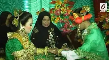 Sebuah rekaman menunjukkan pesta pernikahan pasangan di bawah umur yang terjadi di Sulawesi Barat.