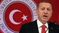 Recep Tayyip Erdogan "naik jabatan" dari Perdana Menteri menjadi Presiden (Huffington Post)