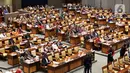Suasana penutupan sidang paripurna DPR ke-6 masa persidangan I 2019-2020 di Kompleks Parlemen, Jakarta, Selasa (17/12/2019). Rapat menyampaikan laporan Baleg DPR RI terhadap Rancangan Peraturan DPR Tentang Tata Cara Penyusunan Prolegnas. (Liputan6.com/Johan Tallo)