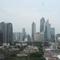 Deretan gedung bertingkat terlihat dari jendela gedung pencakar langit di kawasan Jakarta, Kamis (26/12/2019). Pemerintah memproyeksi pertumbuhan ekonomi tahun depan di kisaran 5,2%, berada di bawah target APBN 2020 sebesar 5,3%.  (Liputan6.com/Angga Yuniar)