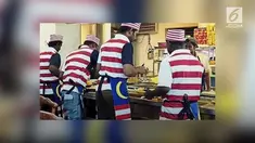 Sebuah foto restoran menjadi viral, setelah pegawainya diduga menggunakan celemek yang menyerupai bendera Malaysia.