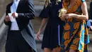 Chelsy Davy tiba menghadiri pernikahan Pangeran Harry dan Meghan Markle di Kapel St George, Kastil Windsor, (19/5). Meski telah putus, Pangeran Harry masih menjalin pertemanan dengan beberapa mantan kekasihnya. (AFP Photo/Chris Jackson)