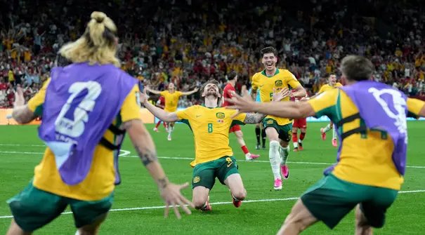 Pemain Australia merayakan kemenangan atas Turki pada laga matchday 1 Grup D Piala Dunia 2026 di BC Place, Vancouver, Kanada, Minggu (14/6/2026) siang WIB. (AP Photo/Abbie Parr)