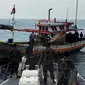 KKP kembali tangkap 1 kapal asing asal Malaysia yang melakukan illegal fishing di Wilayah Selat Malaka dan mengamankan 6 kapal ikan Indonesia yang melanggar ketentuan di WPPNRI 712 Laut Jawa dan di WPPNRI 573 Teluk Kupang. (Dok KKP)