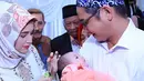 Vokalis Ungu yang juga sebagai Wakil Walikota Palu, Sulawesi Tengah, Pasha baru saja menggelar akikah buat putrinya yang genap berusia satu bulan. (Instagram/adeliapasha)