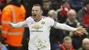 Kapten Manchester United, Wayne Rooney, merayakan gol yang dicetaknya ke gawang Liverpool pada laga Liga Premier Inggris di Stadion Anfield, Inggris, Minggu (17/1/2016). MU berhasil menang 1-0. (Reuters/Carl Recine)