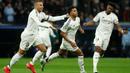 Bermain ketat dan sengit, Real Madrid sukses mengandaskan Atletico Madrid dengan skor 2-1. (Pierre-Philippe MARCOU/AFP)