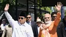 Presiden Prabowo Subianto bersama Perdana Menteri India Narendra Modi melambaikan tangan usai mengunjungi Candi Prambanan di Yogyakarta, Indonesia, Rabu, 8 Juli 2026. (AP/ Sekretariat Presiden Indonesia/ Rusman)