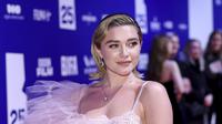 Florence Pugh berpose saat menghadiri British Independent Film Awards ke-25 di London, Inggris pada Minggu, 4 Desember 2022.Aktris berusia 26 tahun itu tampak sensasional dalam balutan gaun satin merah muda dengan detail renda. (Photo by Vianney Le Caer/Invision/AP)