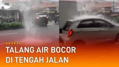 Terlihat talang air bocor hingga membuat air mengucur deras di tengah jalan.