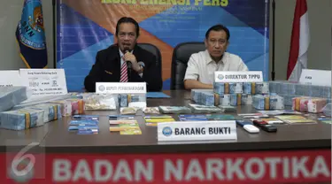 Deputi Pemberantasan Narkotika, Irjen Pol Arman Depari memberikan keterangan saat merilis Tindak Pidana Pencucian Uang (TPPU) narkotika di BNN, Jakarta, Kamis (24/11). BNN menyita aset senilai Rp 153 Miliar dari tersangka MI. (Liputan6.com/Gempur M Surya)