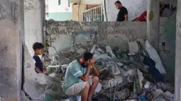 Hari ini, 26 Mei 2025, sedikitnya 52 orang tewas, 33 di antaranya di sebuah sekolah yang dijadikan tempat penampungan dalam serangan militer Israel yang menghancurkan di Jalur Gaza. (Omar AL-QATTAA/AFP)