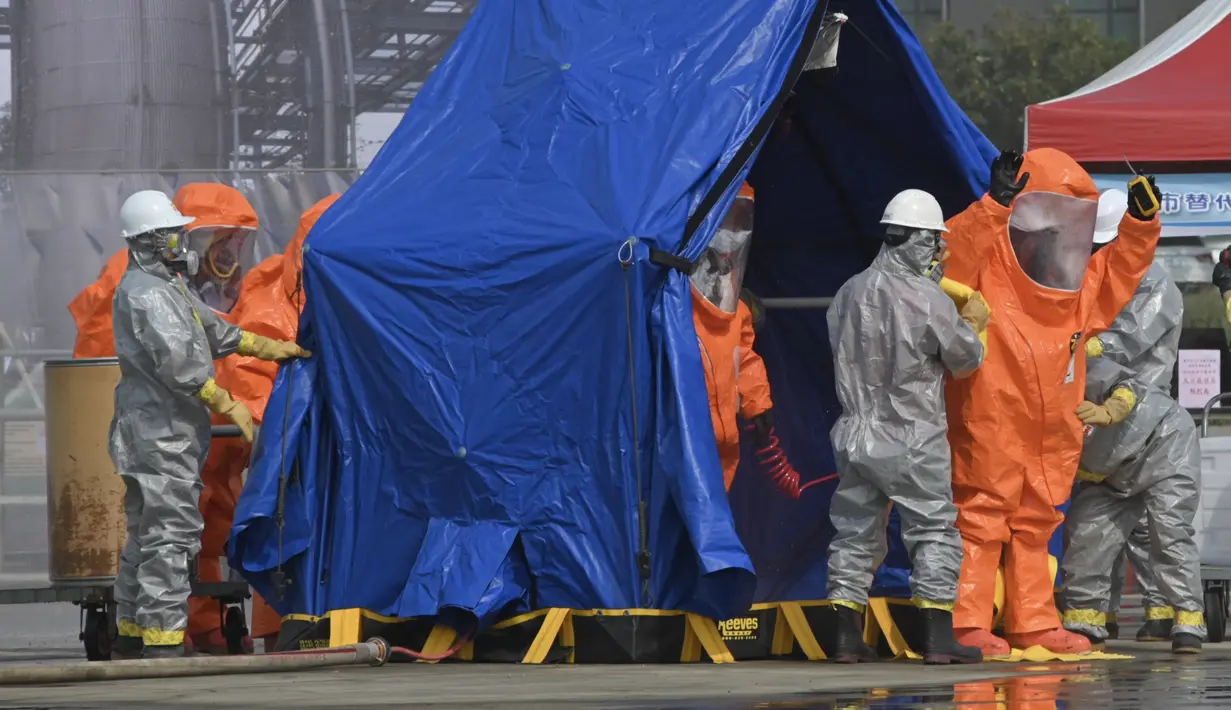 <p>Mempertimbangkan situasi geopolitik di sekitar Taiwan, latihan pertahanan sipil tahun ini akan melihat peningkatan latihan masa perang dari 50 persen menjadi 70 persen dari total. (Sam Yeh/AFP)</p>
