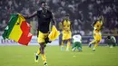 Pemain Ghana melakukan selebrasi pada akhir pertandingan leg kedua kualifikasi Piala Dunia 2022 melawan Nigeria di Stadion Moshood Abiola, Abuja, Nigeria, 29 Maret 2022. Ghana lolos ke Piala Dunia 2022 setelah unggul agregat gol tandang, skor akhir pertandingan ini 1-1. (AP Photo/Sunday Alamba)