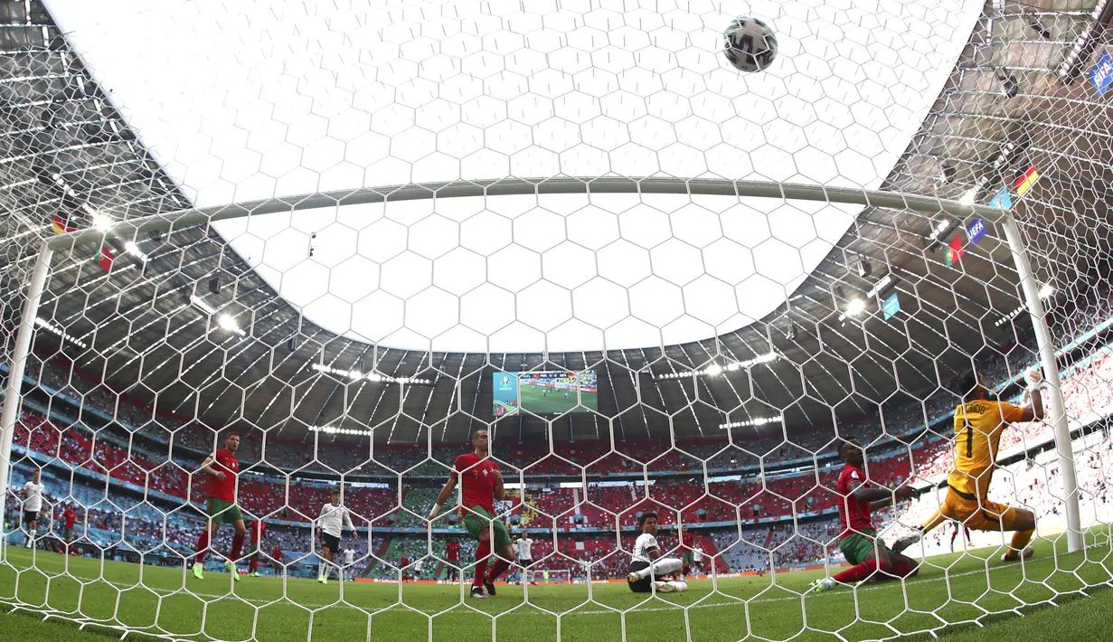 Jerman sukses memperpanjang nafas mereka di fase grup setelah tumbangkan Portugal. Pertandingan antara negara unggulan Euro 2020 (Euro 2021) diwarnai dengan gol yang saling berbalas. (Foto: AP/Matthias Schrader)