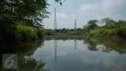 Kondisi kawasan Waduk Giri Kencana, Cilangkap, Jakarta Timur, Selasa (2/5). Setelah beroperasi secara penuh, waduk Giri Kencana diprediksi akan mampu menampung air dari pemukiman di sekitar waduk saat musim penghujan. (Liputan6.com/Gempur M Surya)