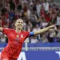 Striker timnas putri AS Alex Morgan merayakan gol ke gawang Inggris pada semifinal Piala Dunia Wanita 2019 di Stade de Lyon, Selasa (2/7/2019) atau Rabu dini hari WIB. (AP Photo/Alessandra Tarantino)